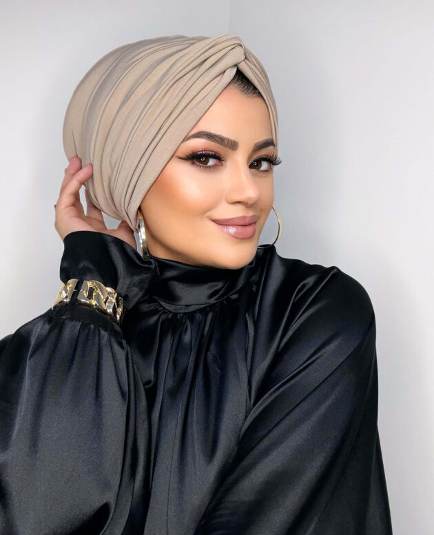 bej-dolgulu-dugum-bone-tesettur-dis-