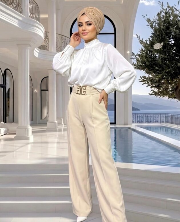 Bej Kemerli Pantolon yüksek bel tasarımı ve kendi kumaşından kemeriyle şık ve modern kadın pantolonu.