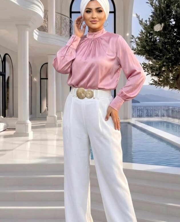 Lidya Pembe Gömlek modeli, ithal keten kumaştan üretilmiş rahat kesimli ve zarif pembe renkli kadın gömlek.